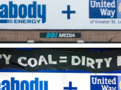 Activists Unfurl Banner Over ‘Peabody United Way’ Billboard